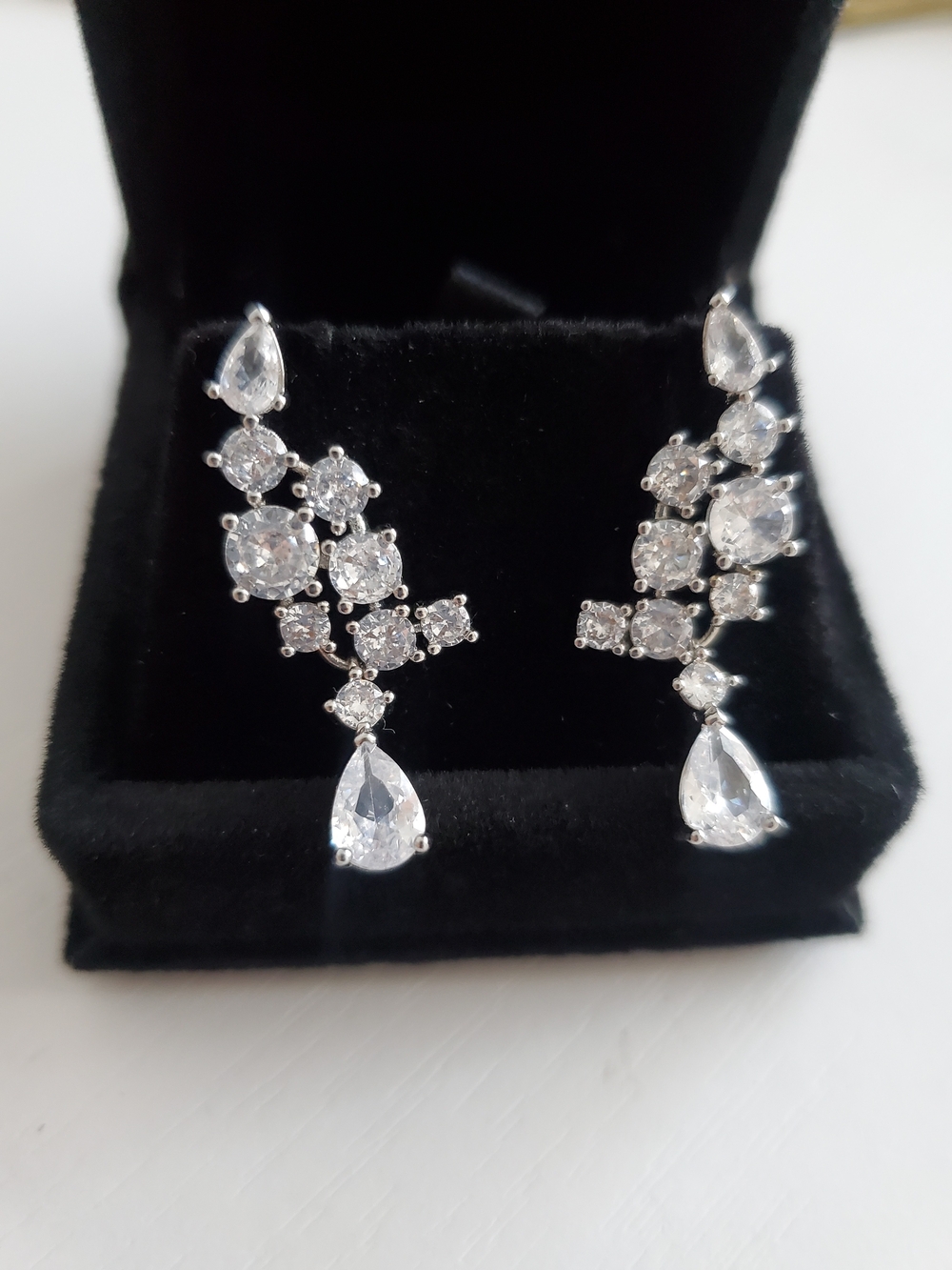 Elegant White Crystal Drop Earrings - Sparkling Dangle Style